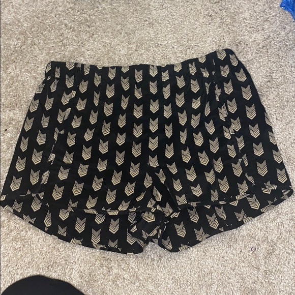 Fabric Black and Tan patterned shorts - Picture 1 of 3